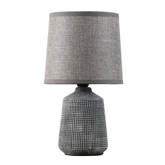 Lampa stołowa z teksturowaną podstawą i abażurem z tkaniny